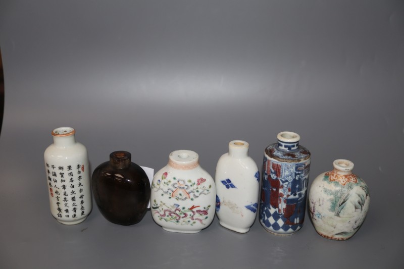 Five 19th century Chinese porcelain snuff bottles and a smoky quartz snuff bottle